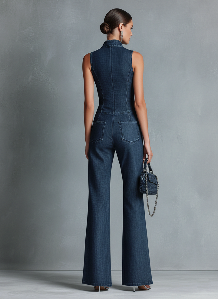 Women's dark blue retro-style sleeveless jumpsuit with stand-up collar, flared cut, and front zip.