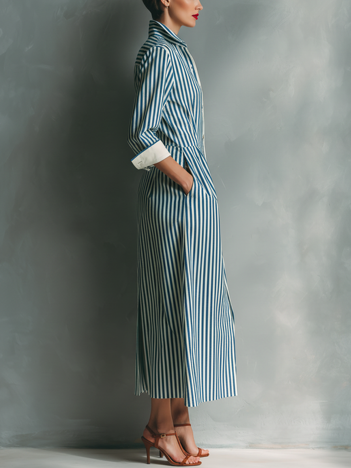 Women's shirt dress in blue and white with a red breast pocket