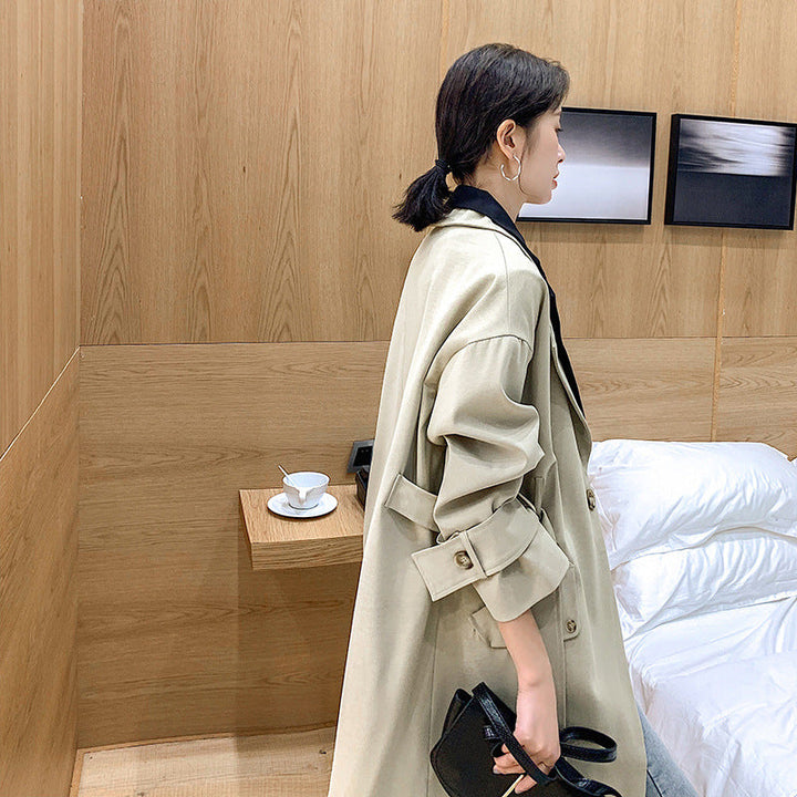 Women’s oversized trench coat with a contrasting yoke and roll-up sleeves