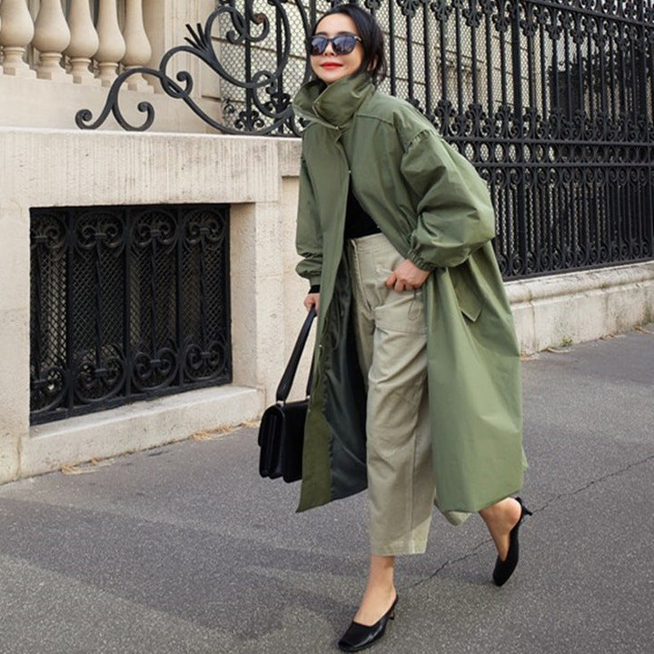 Women's oversized coat with stand-up collar, drawstring waist, and balloon sleeves