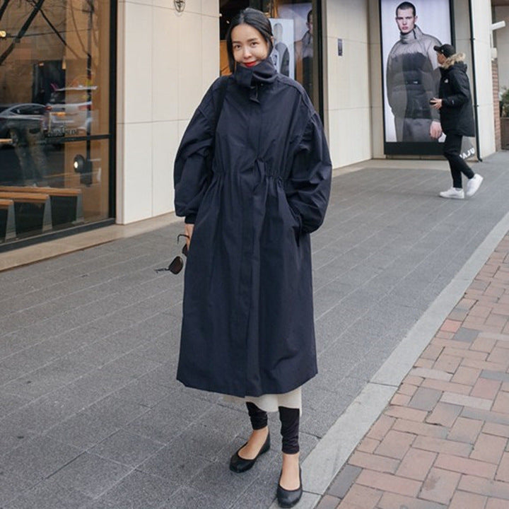 Women's oversized coat with stand-up collar, drawstring waist, and balloon sleeves