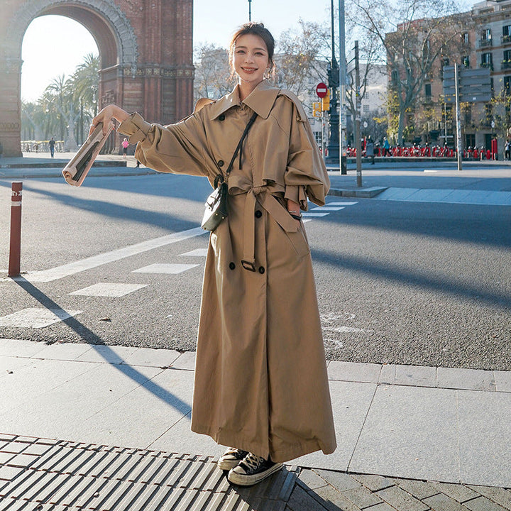 Women's oversized trench coat with balloon sleeves and a waist belt