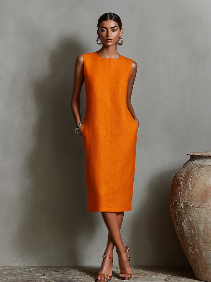 Women's orange sheath dress with sleeveless crew neck and side pockets, timeless minimalist-elegant style