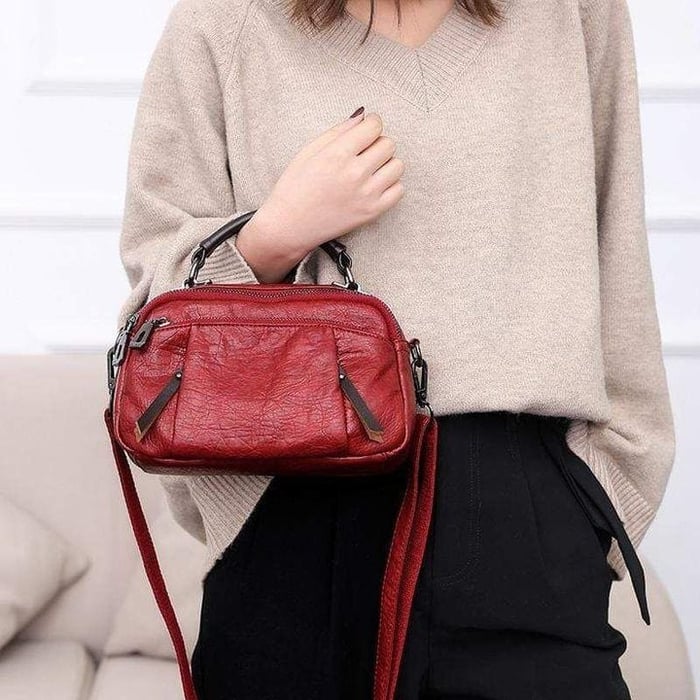 Finbjørg | Small and versatile bag in a golden cognac shade