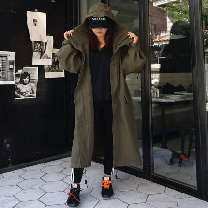 Women’s oversized parka with an extra-long cut and large hood