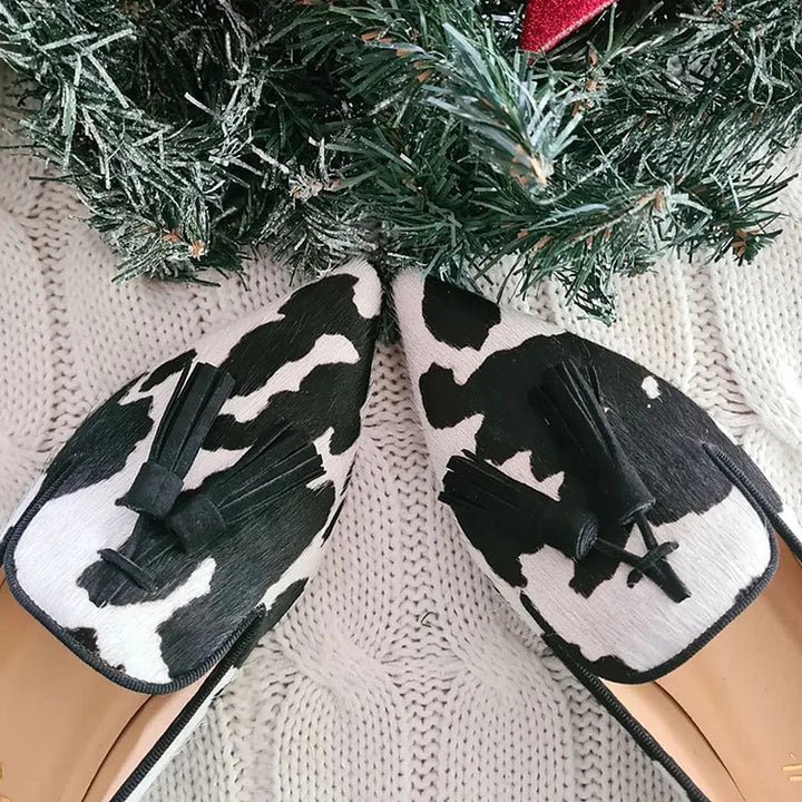 COW PRINT LOAFERS WITH TASSELS
