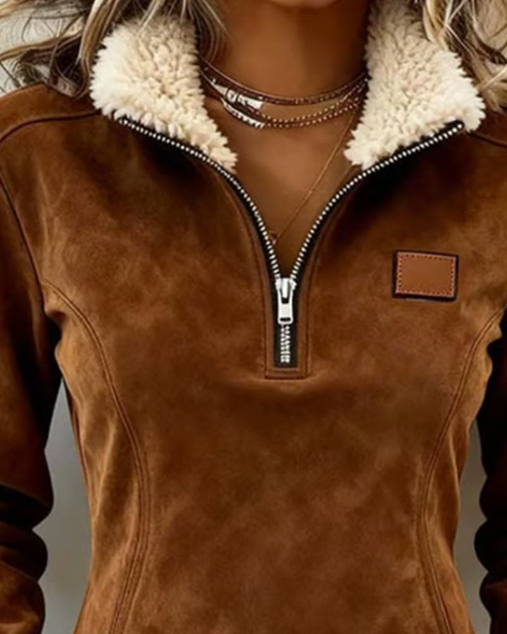 Half-zip collar sweatshirt with asymmetrical design and fringe accents