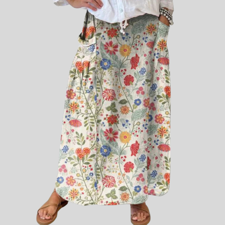 Women's linen skirt with floral print, elastic waistband, and pockets