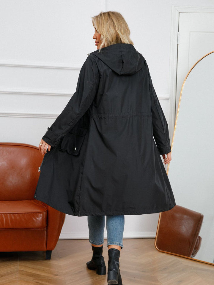 Women’s waterproof raincoat with hood and adjustable drawstring