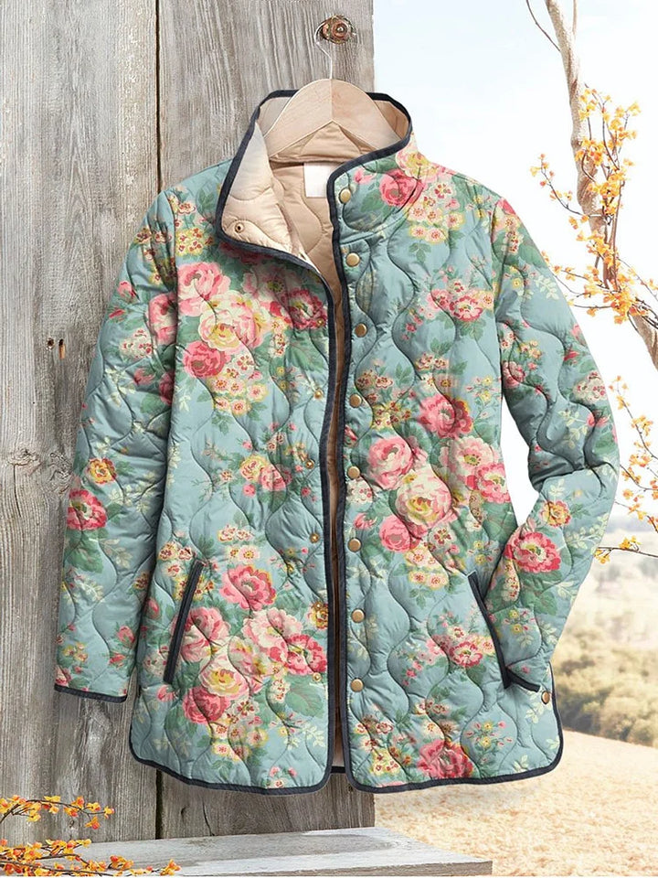 Women's quilted jacket with a beautiful floral pattern