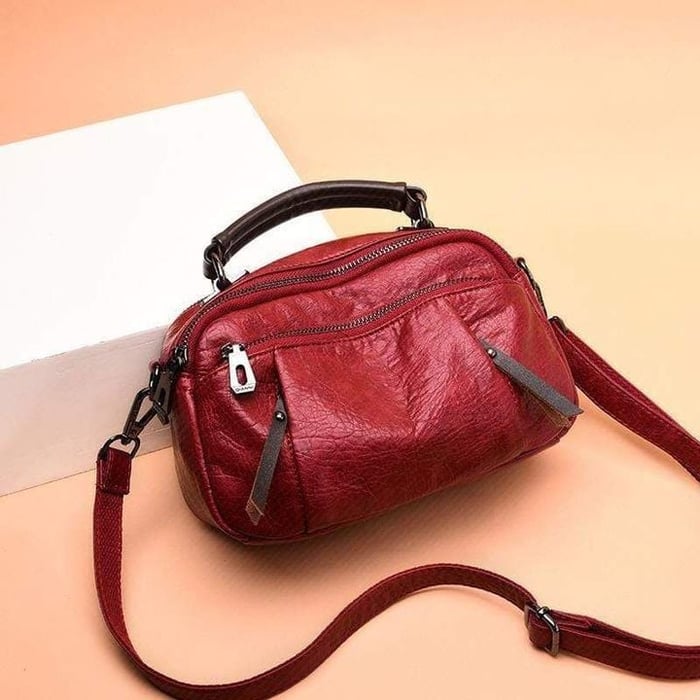 Finbjørg | Small and versatile bag in a golden cognac shade