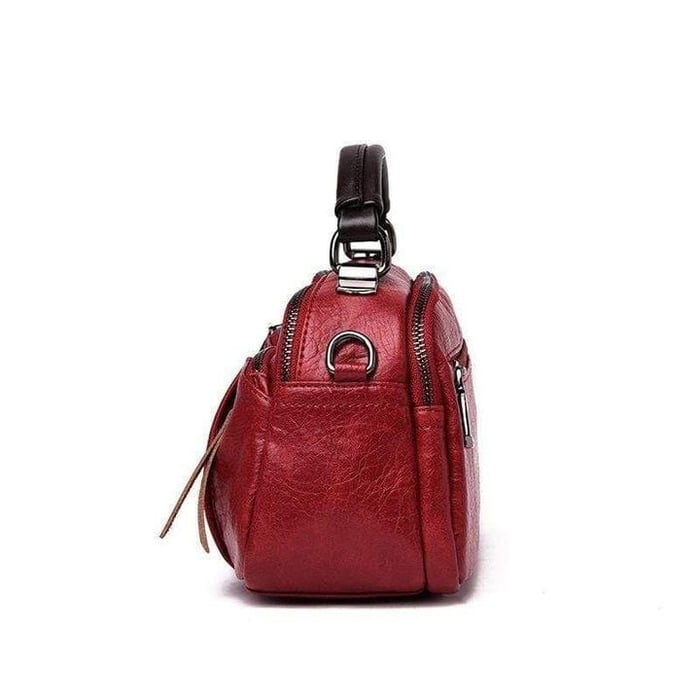 Finbjørg | Small and versatile bag in a golden cognac shade