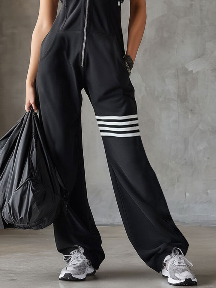 Retro-inspired black sleeveless hooded jumpsuit with sporty lace-up stripes