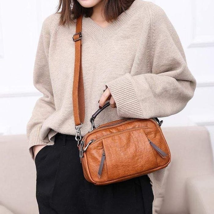 Finbjørg | Small and versatile bag in a golden cognac shade