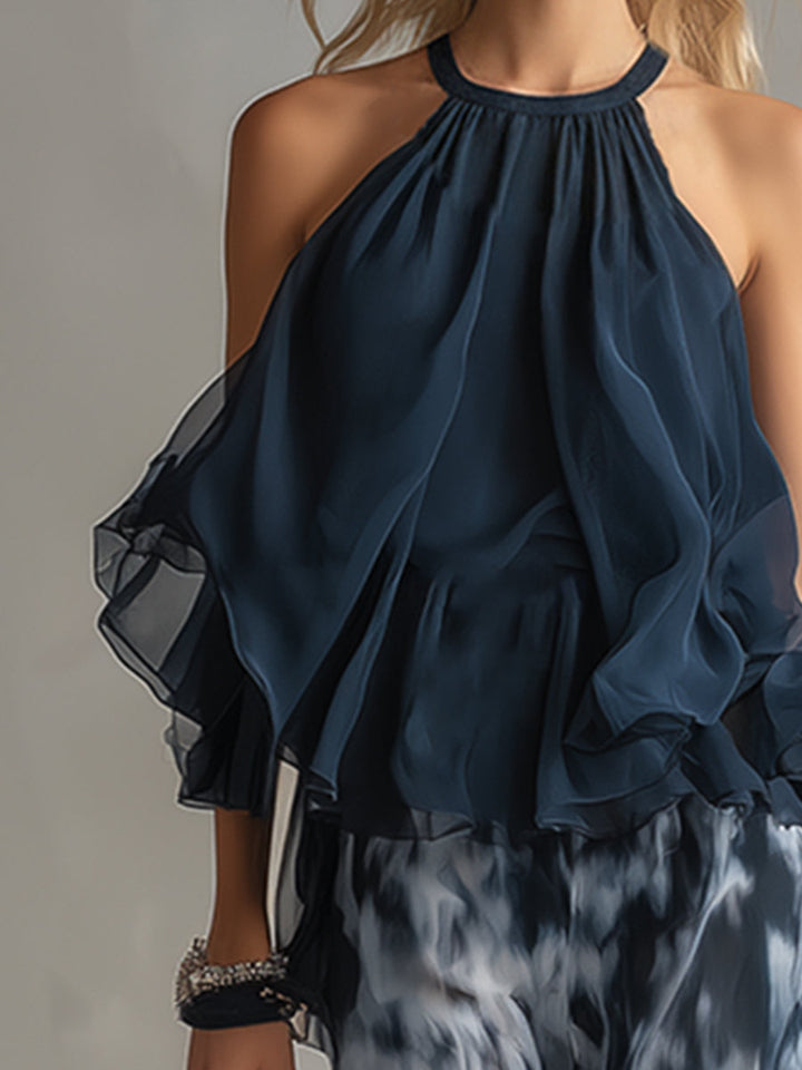 Ludovica – Chic ensemble with high-neck blouse shirt and flowing printed trousers