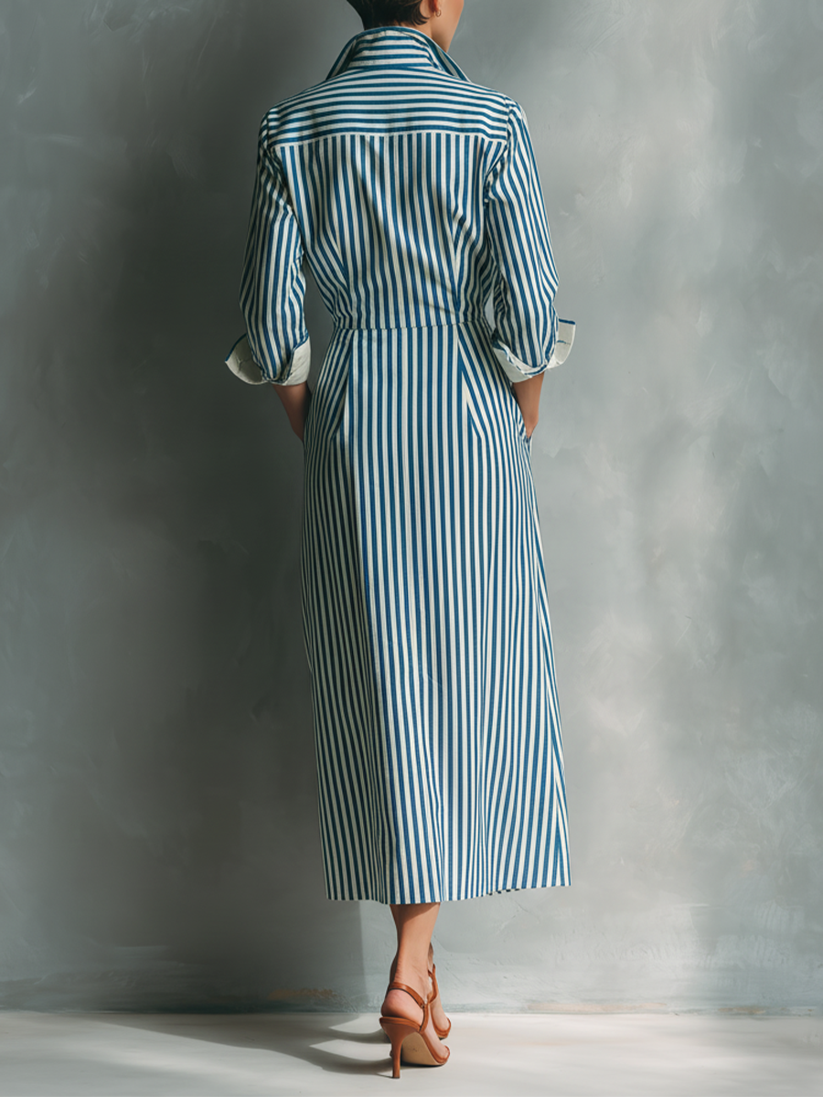 Women's shirt dress in blue and white with a red breast pocket