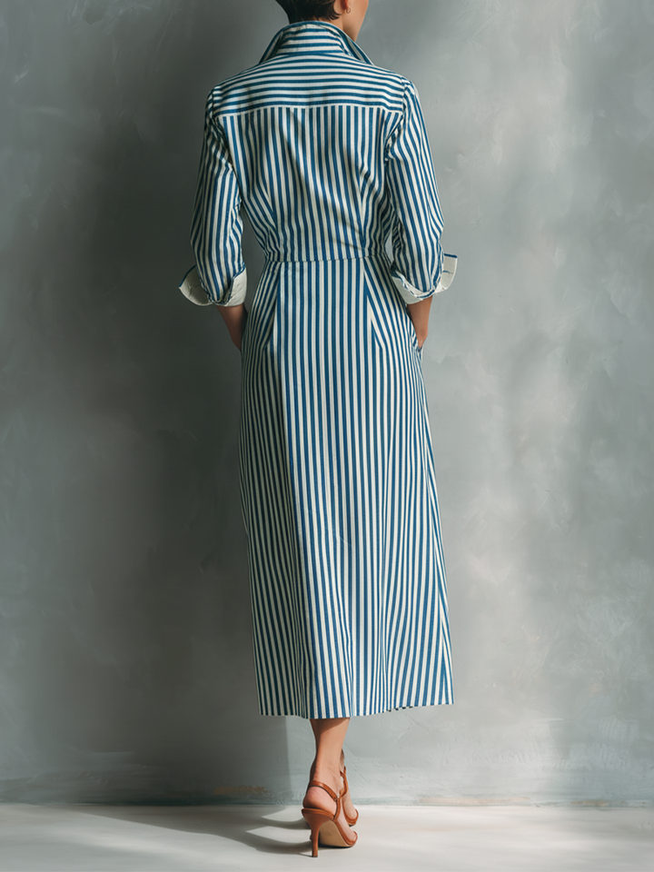 Women's shirt dress in blue and white with a red breast pocket