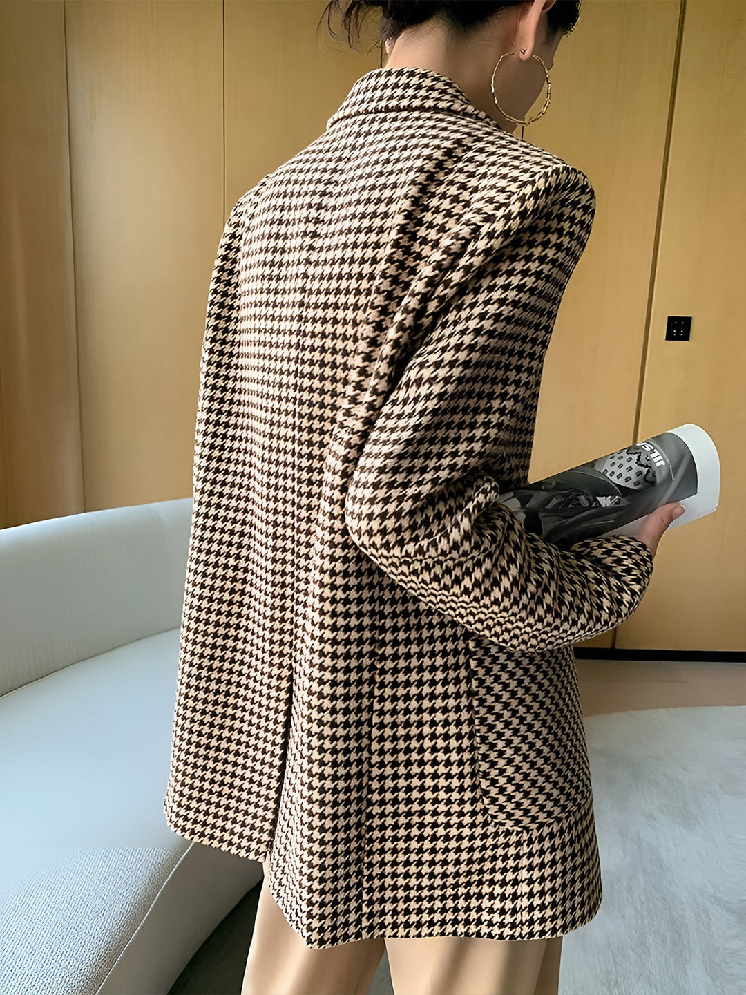 Women's houndstooth blazer with belt, buttons, and pockets