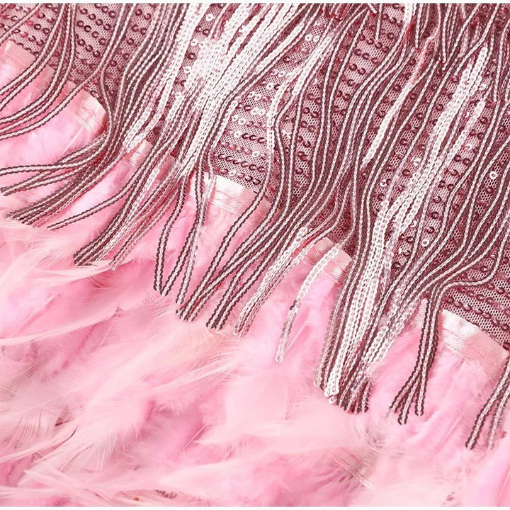 Figure-flattering feathered mini dress