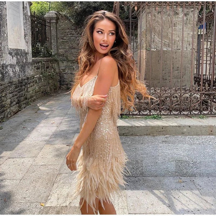 Figure-flattering feathered mini dress