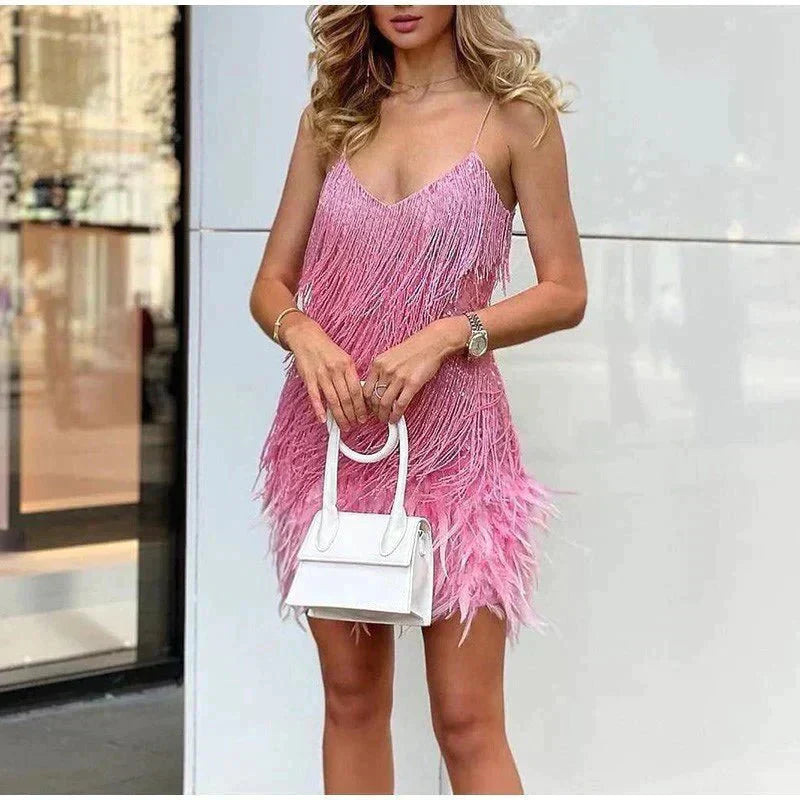 Figure-flattering feathered mini dress