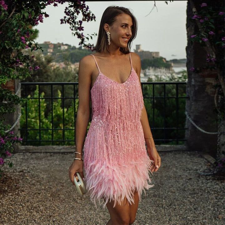 Figure-flattering feathered mini dress