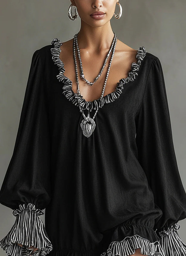 Faux suede mini dress with black stripes and ruffle details