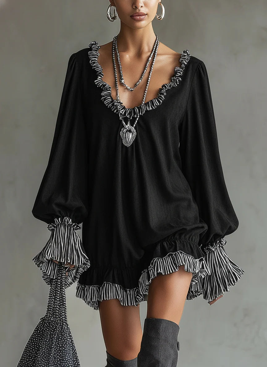 Faux suede mini dress with black stripes and ruffle details