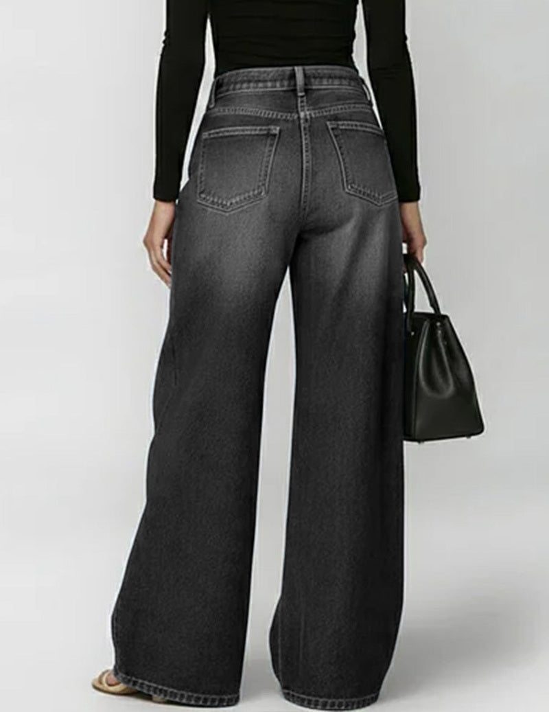 Wide denim trousers with golden eyelet side cut-outs