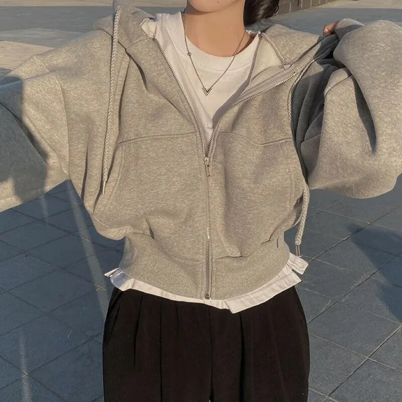 Women's oversized hooded jacket with zipper and pockets