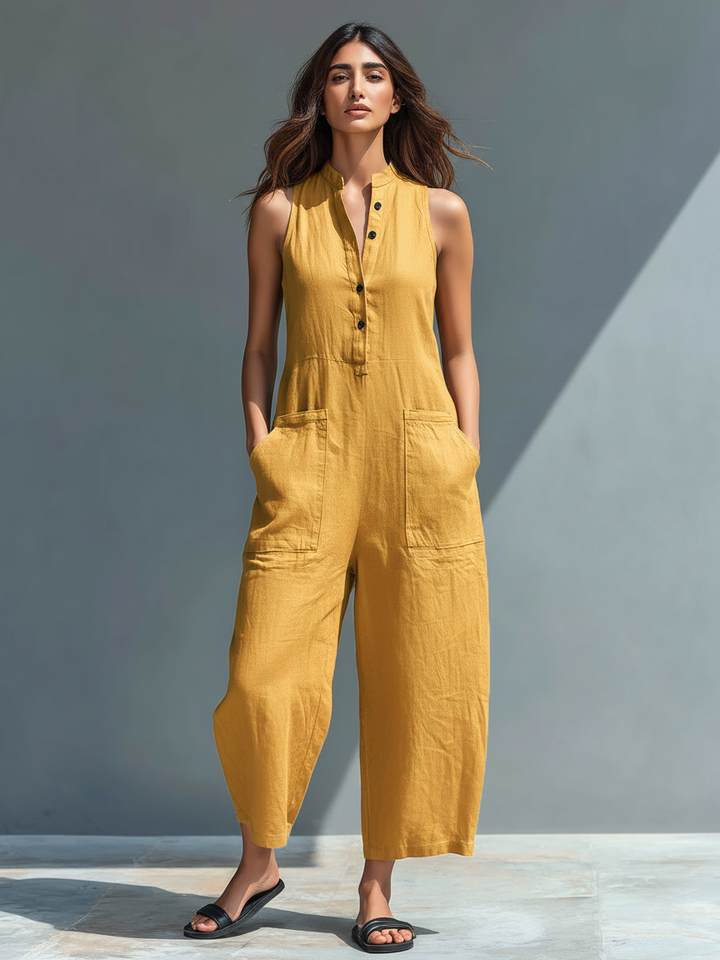 Minimalist women's jumpsuit with a stand-up collar, button placket, and a casual, loose fit