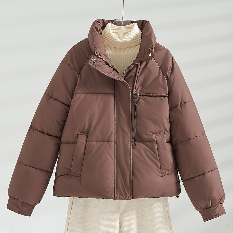 Women’s short padded boxy jacket with a high stand-up collar and drawstring