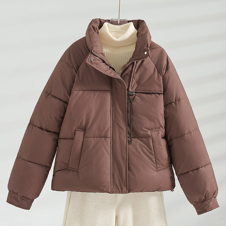 Women’s short padded boxy jacket with a high stand-up collar and drawstring