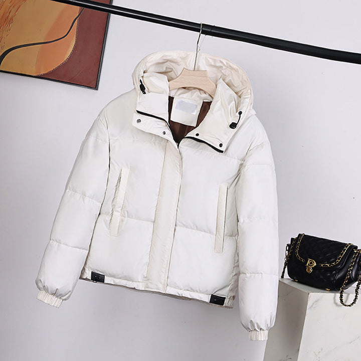 Women’s padded hooded jacket in a boxy cut with a concealed zipper placket