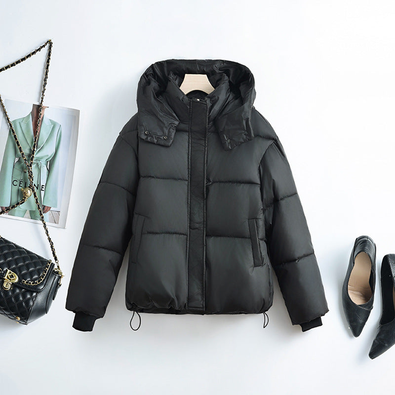 Women's short microfiber puffer jacket with removable collar padding and drawstring hem