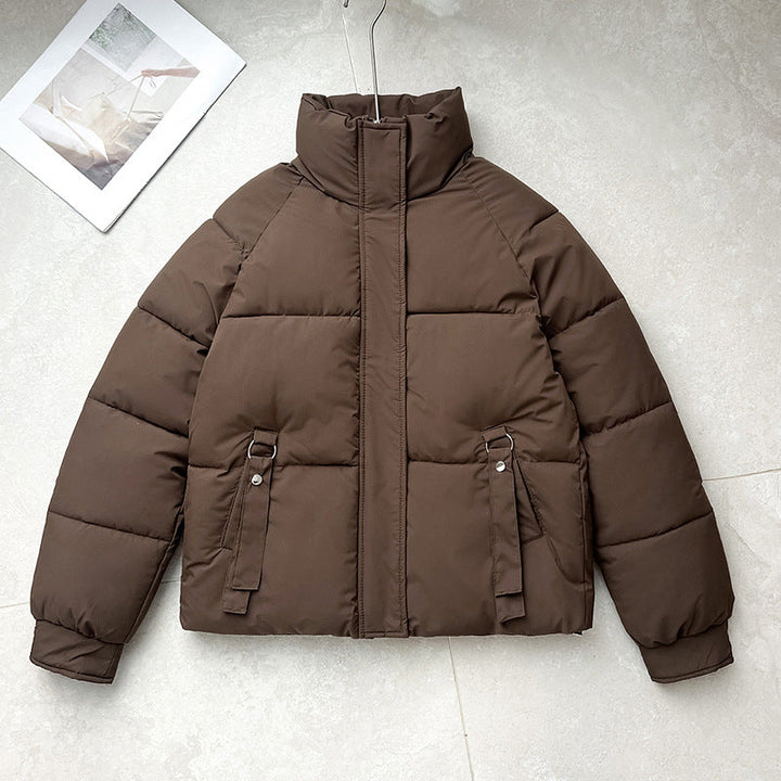 Women’s short quilted jacket with a high stand-up collar and D-ring pocket