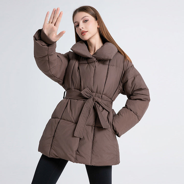 Women's fitted quilted coat with a tie belt and high shawl collar