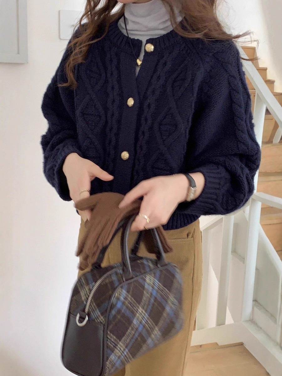 Women's cardigan with a round neckline and long sleeves