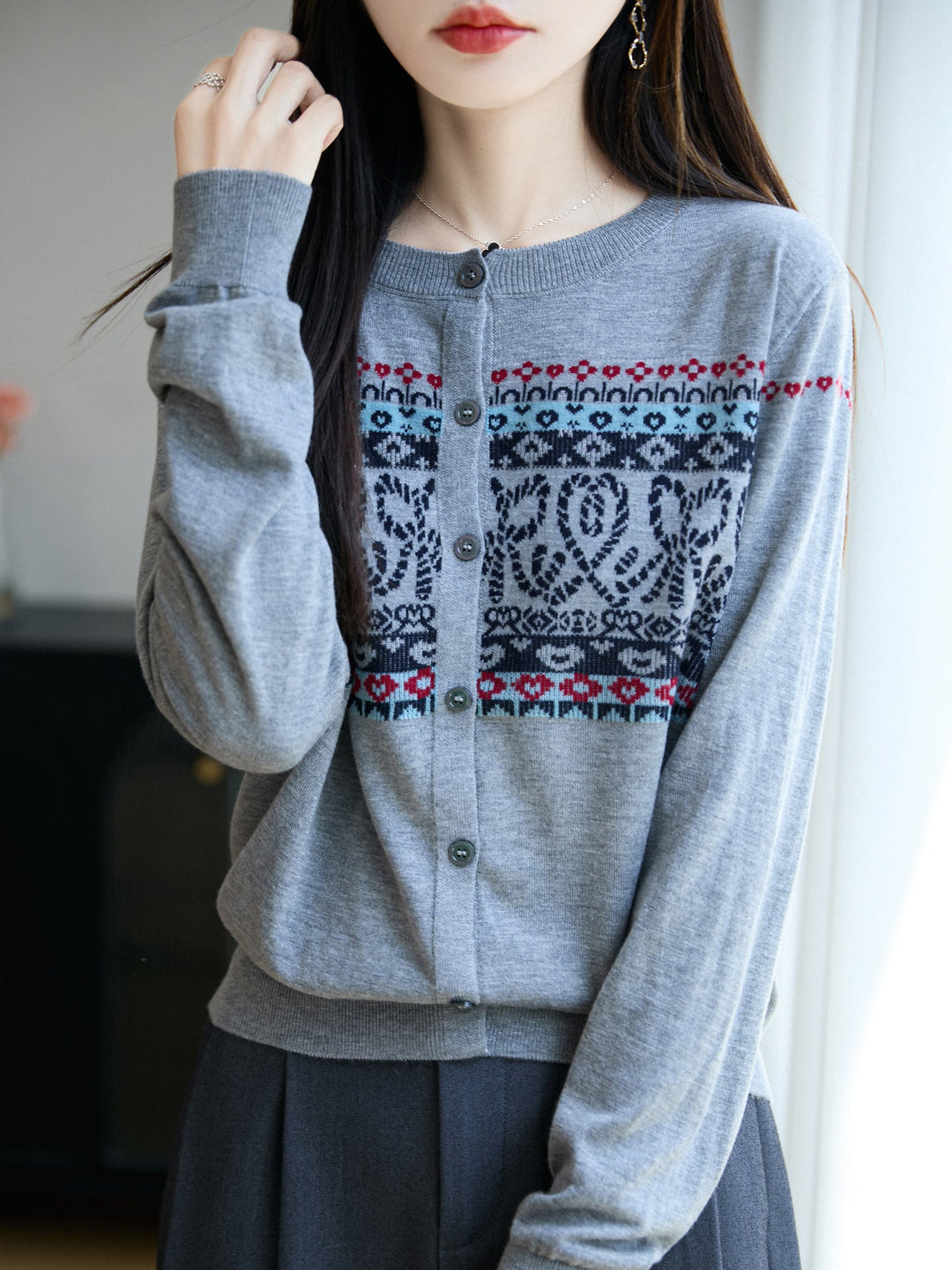 Women's cardigan with a round neckline and long sleeves