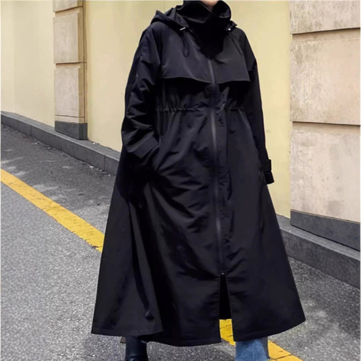 Women’s water-repellent oversized raincoat with hood and A-line silhouette