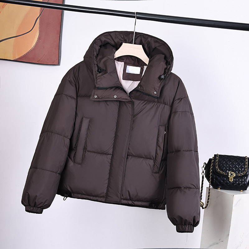 Women’s padded hooded jacket in a boxy cut with a concealed zipper placket