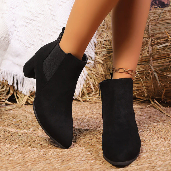 Women’s ankle boots with block heels and a zipper