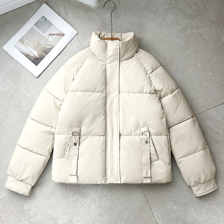 Women’s short quilted jacket with a high stand-up collar and D-ring pocket