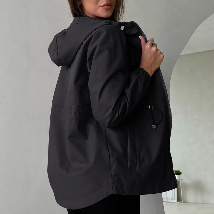 Women's outdoor jacket with adjustable hood and spacious pockets