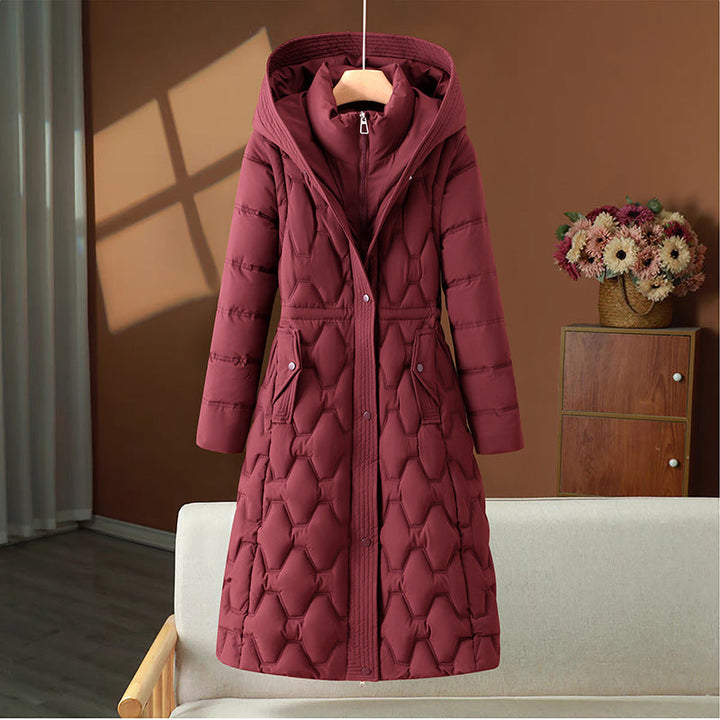 Women’s long quilted winter coat with a hood and fitted silhouette