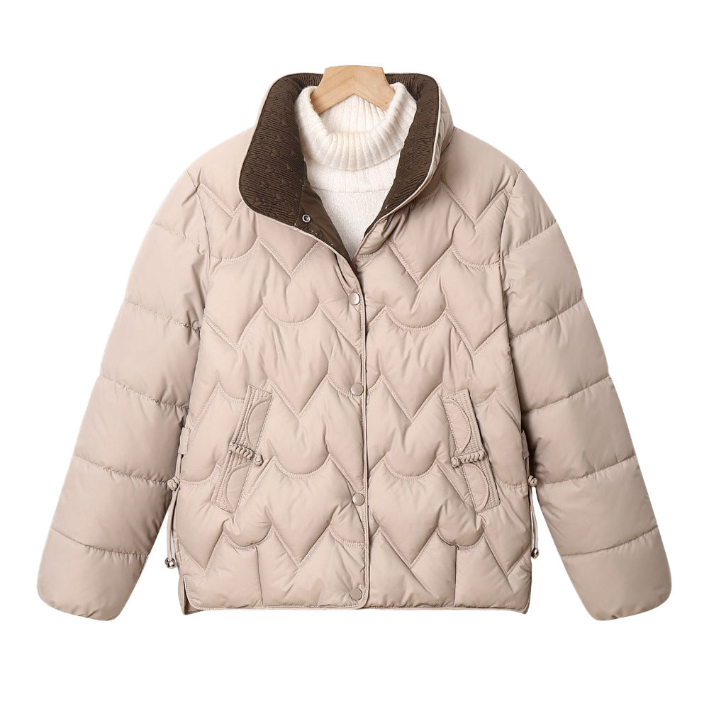 Women’s short quilted jacket with curved quilting and snap-button placket