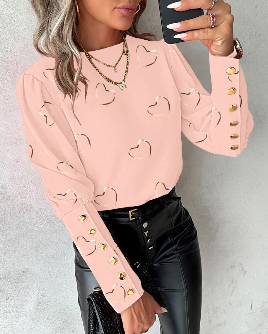 Women's blouse with a round neckline and long sleeves