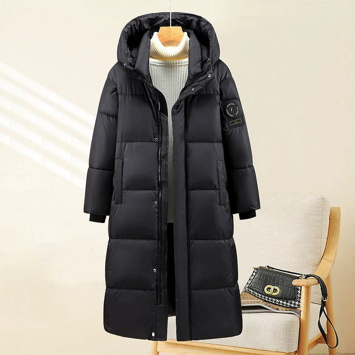 Women’s extra-long quilted thermal parka with hood and ribbed cuffs