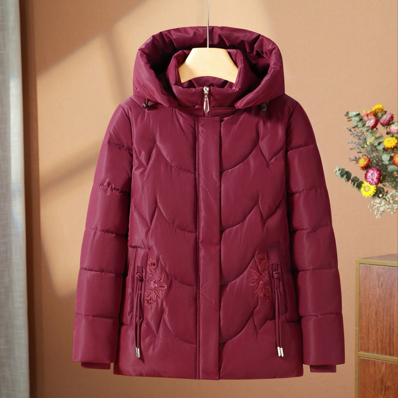Women’s quilted thermal outdoor jacket with a hood and floral pocket embroidery