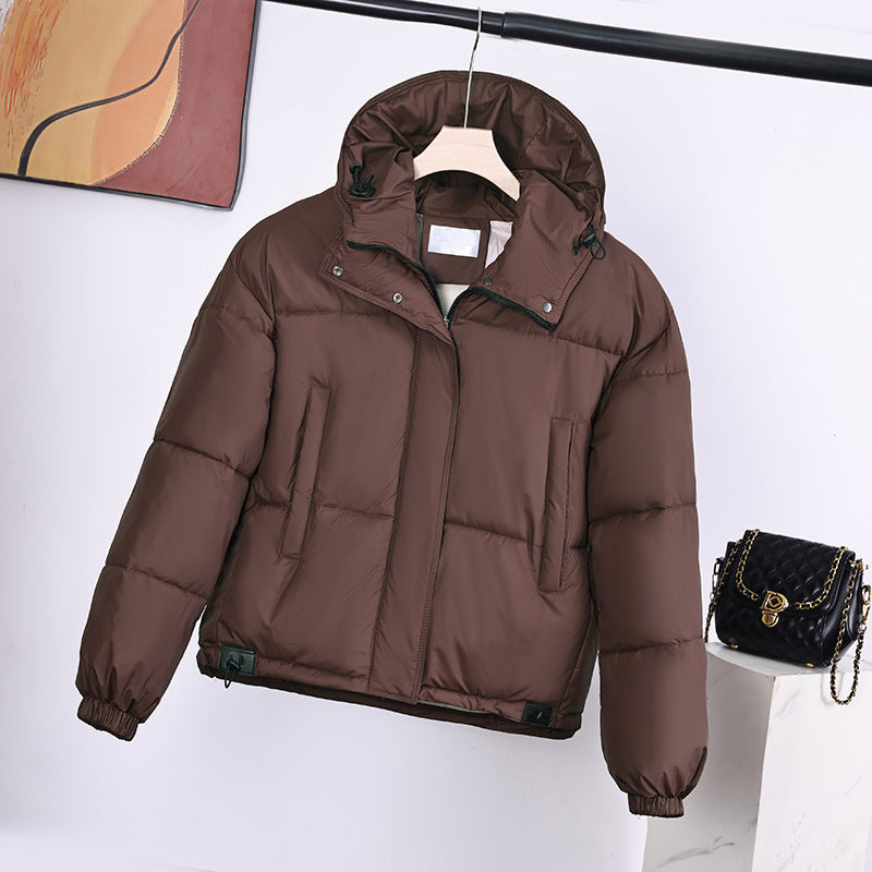 Women’s padded hooded jacket in a boxy cut with a concealed zipper placket